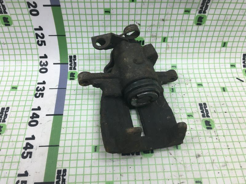 Суппорт тормозной задний левый Volkswagen